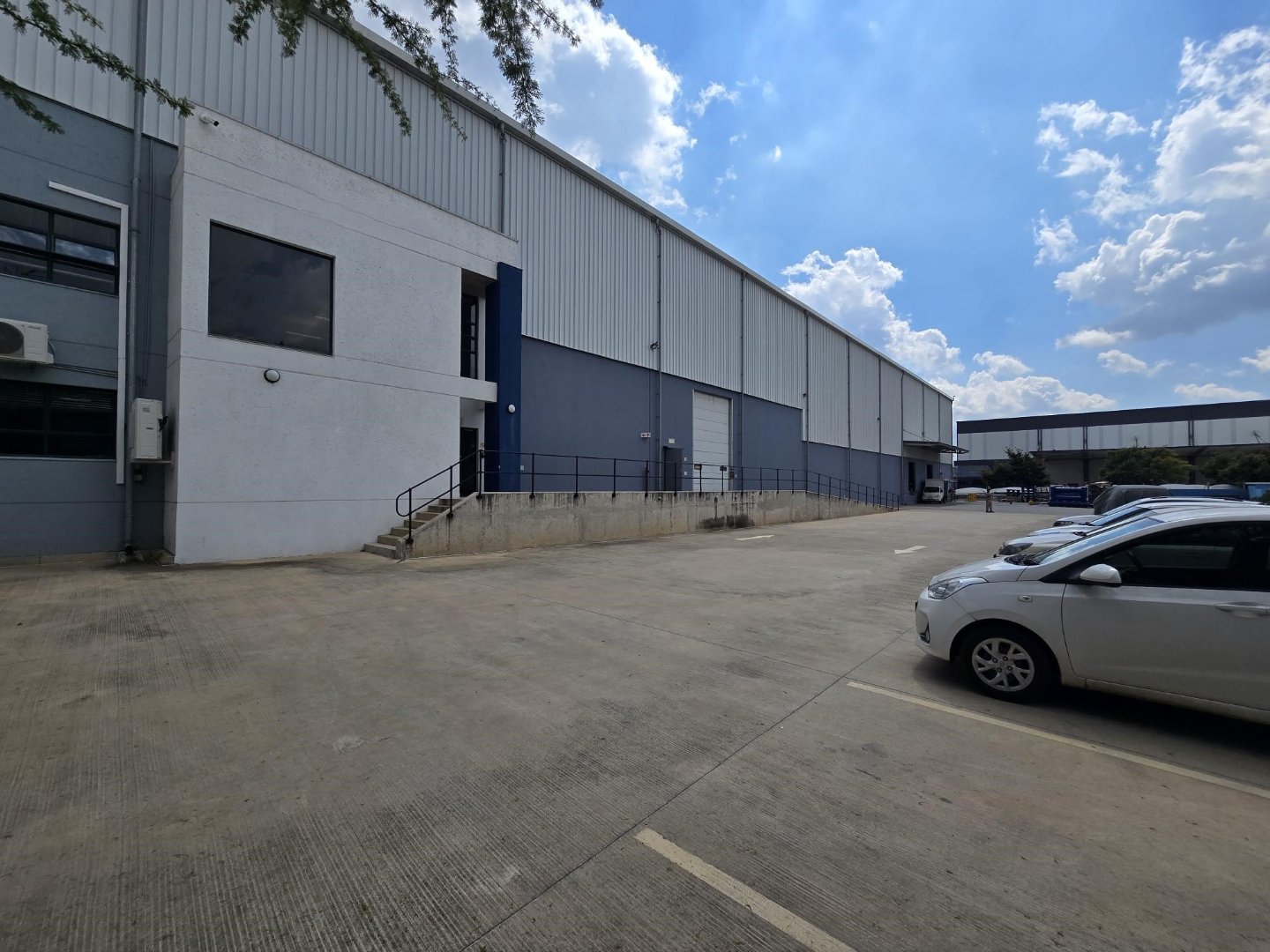 Modern industrial warehouse in Meadowview with ample parking and loading areas.