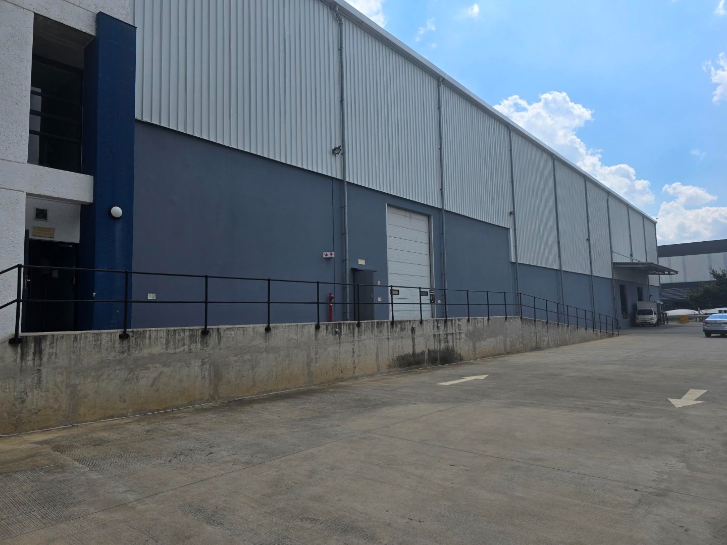 Modern industrial warehouse in Meadowview with large roller doors and loading areas.