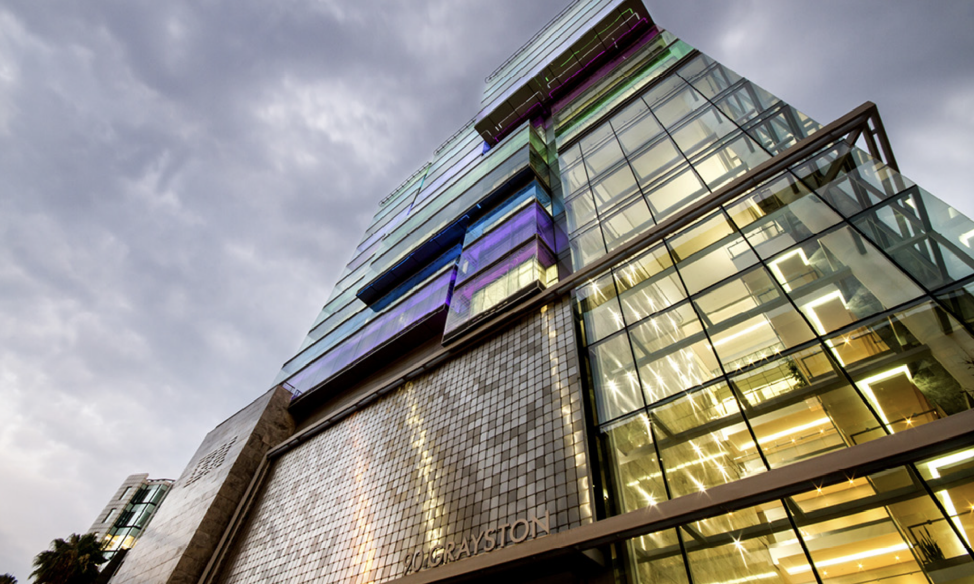 Modern office and warehouse building of Currie Group with glass facades and contemporary architecture, showcasing their long-standing presence since 1887.