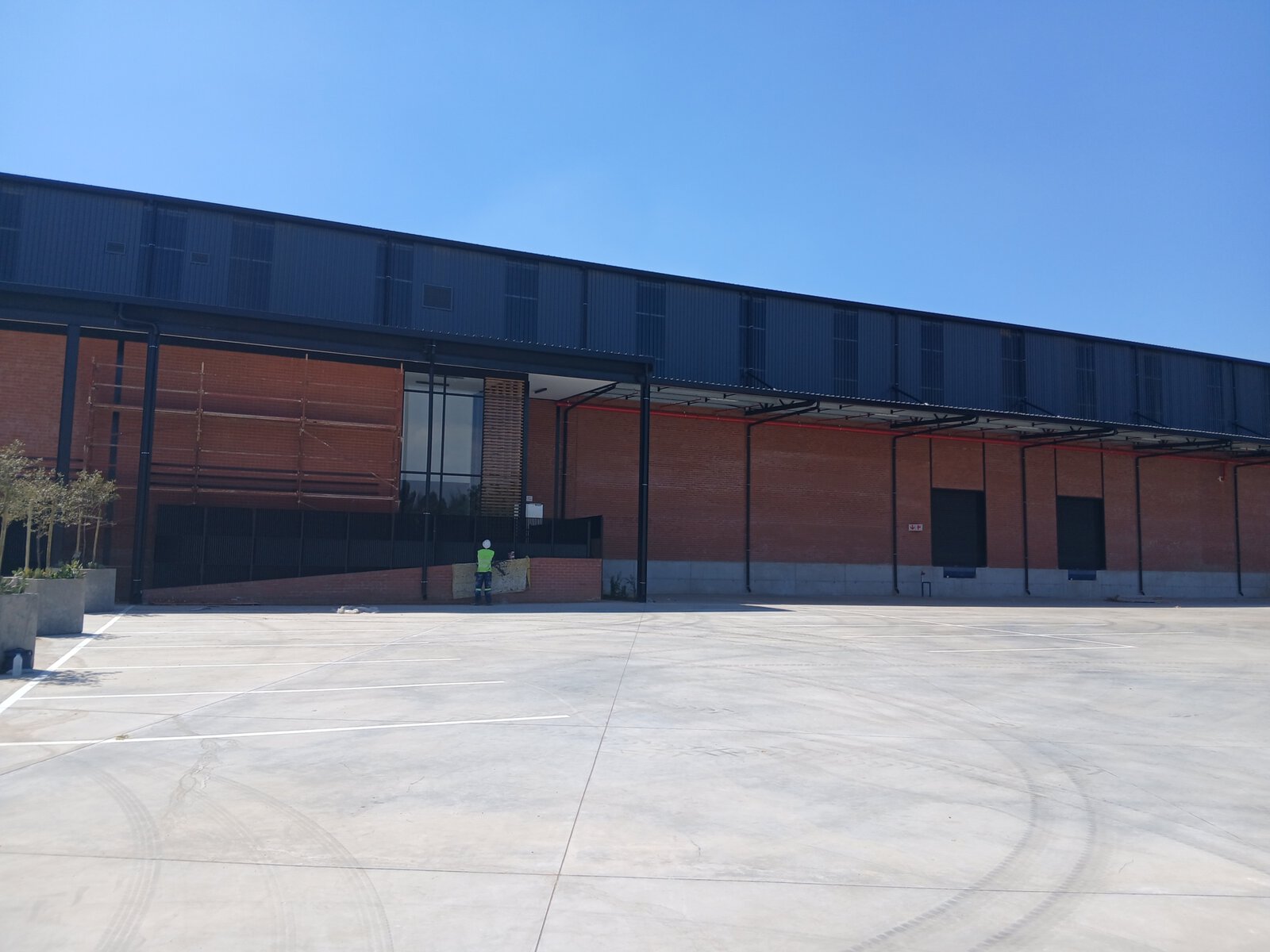 Modern warehouse facility at Currie Group with large open space and contemporary design, showcasing their extensive warehousing capabilities since 1887.